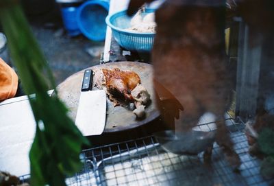 Close-up of duck on barbecue grill