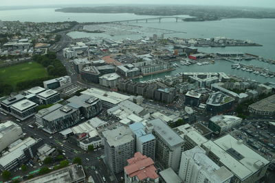 High angle view of crowd by buildings in city