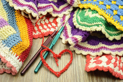 High angle view of colorful crochets on table