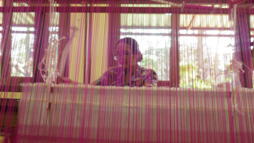 Close-up of woman standing in pond