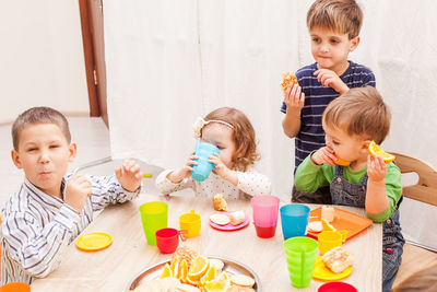 Children having food at preschool