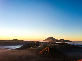 Scenic view of mountain against sky during sunset