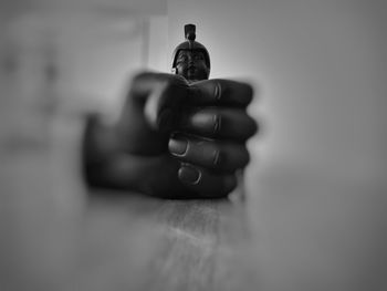 Close-up of man holding table