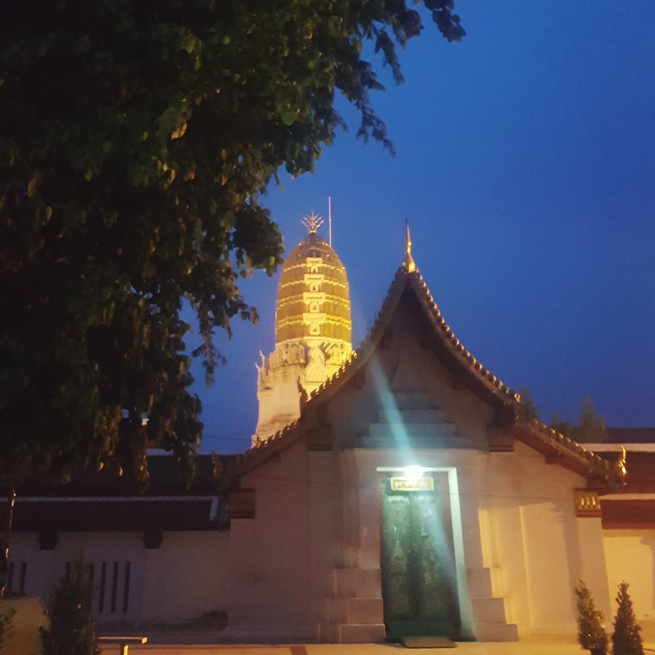 architecture, religion, built structure, building exterior, spirituality, place of worship, tree, travel destinations, history, no people, gold colored, outdoors, low angle view, statue, day, illuminated, sky