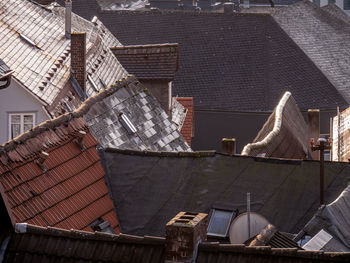 High angle view of roof and houses in city