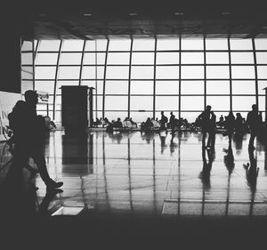 Silhouette people at airport