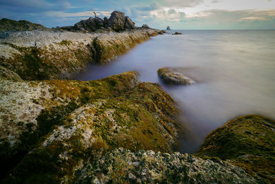 Scenic view of water against sky