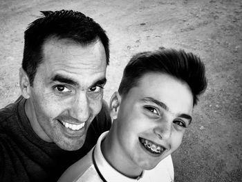 Portrait of smiling man with woman