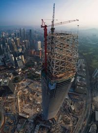 High angle view of construction site against buildings in city