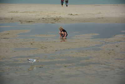 Full length of woman on beach