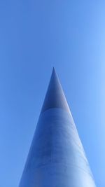 Low angle view of building against blue sky