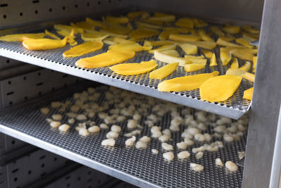 High angle view of yellow food in container