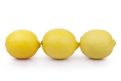 Close-up of fruits against white background