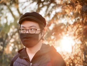 Portrait of young man wearing eyeglasses