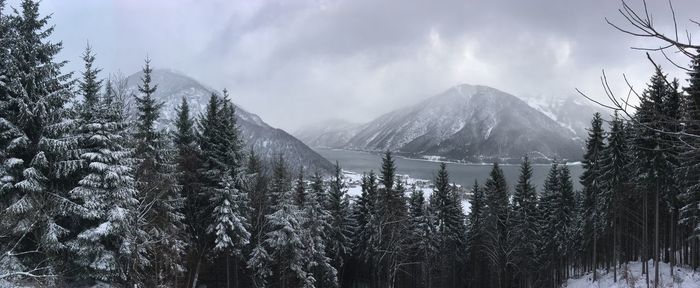 Scenic view of snowcapped mountains against sky