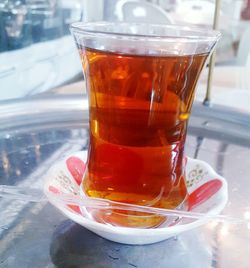 Close-up of tea in glass on table