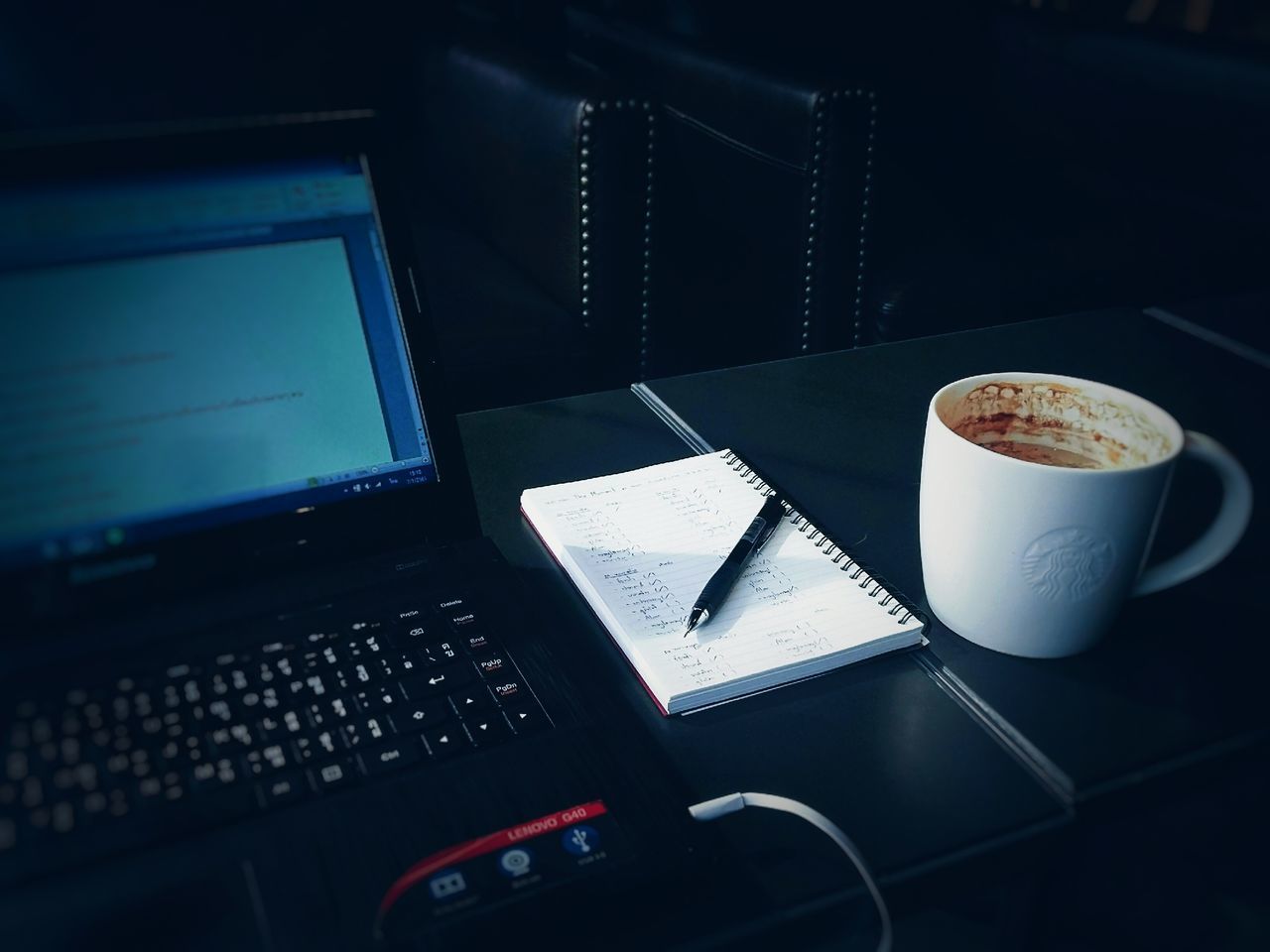 COFFEE CUP ON TABLE AT CAFE