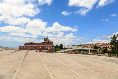 View of building against cloudy sky