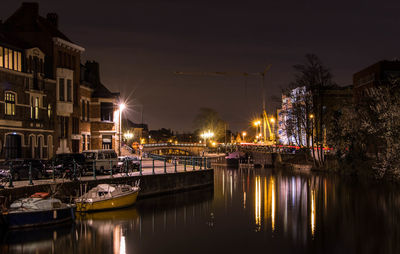 Illuminated buildings in city at night