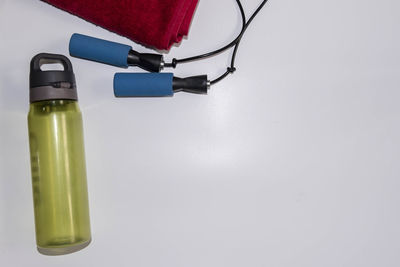 High angle view of drink on table against white background