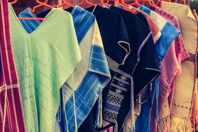 Close-up of clothes for sale at store 