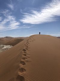 Scenic view of desert against sky