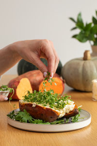 Close-up of hand holding food