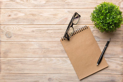 Directly above shot of spiral notebook on table