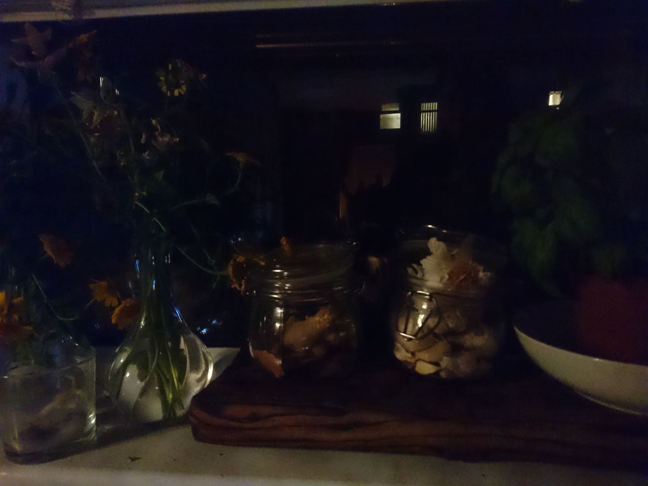 CLOSE-UP OF JAR WITH TABLE