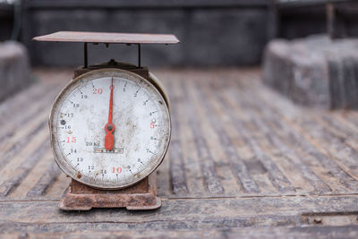 Close-up of abandoned weight scale on truck