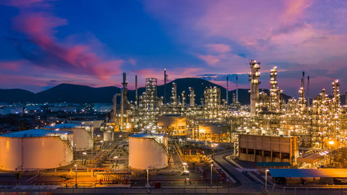 Oil and gas refinery plant and storage tank form industry zone with blu sky background, oil and gas