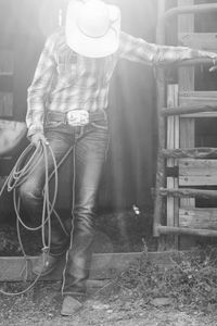 Man wearing hat standing outdoors