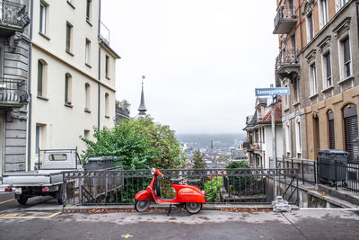 A view of a street in zurich with red bike
