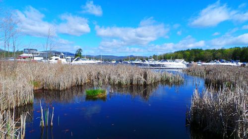 Boats in calm lake