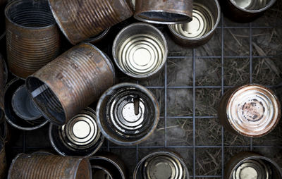 Full frame shot of group of old tin cans 