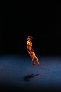 Woman dancing on stage