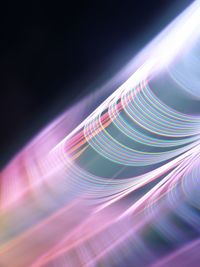 Close-up of light trails against black background