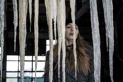 Portrait of a young woman looking away