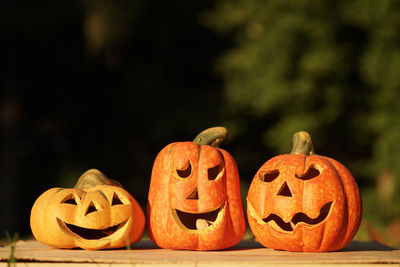 Jack o lanterns on wood