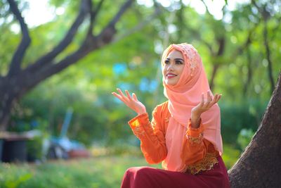 Woman sitting outdoors