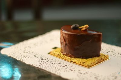 Slice of cake on place mat