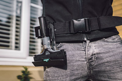 Close-up of man holding camera