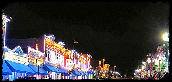 Low angle view of illuminated building at night