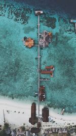 High angle view of building by sea during winter