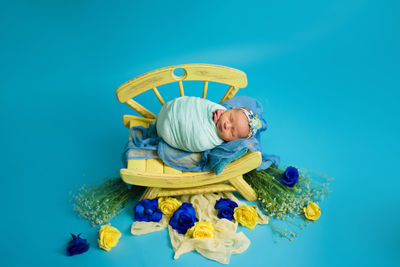 Concept patriotic ukrainian shooting of a newborn