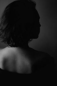 Rear view of woman looking away