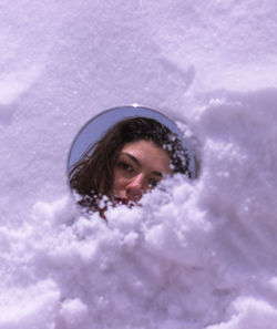 Portrait of woman in snow