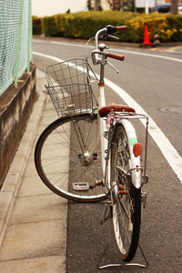 Bicycle parked on footpath