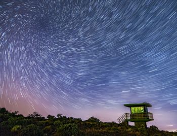 Low angle view of star field against sky at night