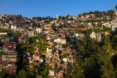 Mountainside view of shimla in the himalayas, india with christ church visible as the highest point 